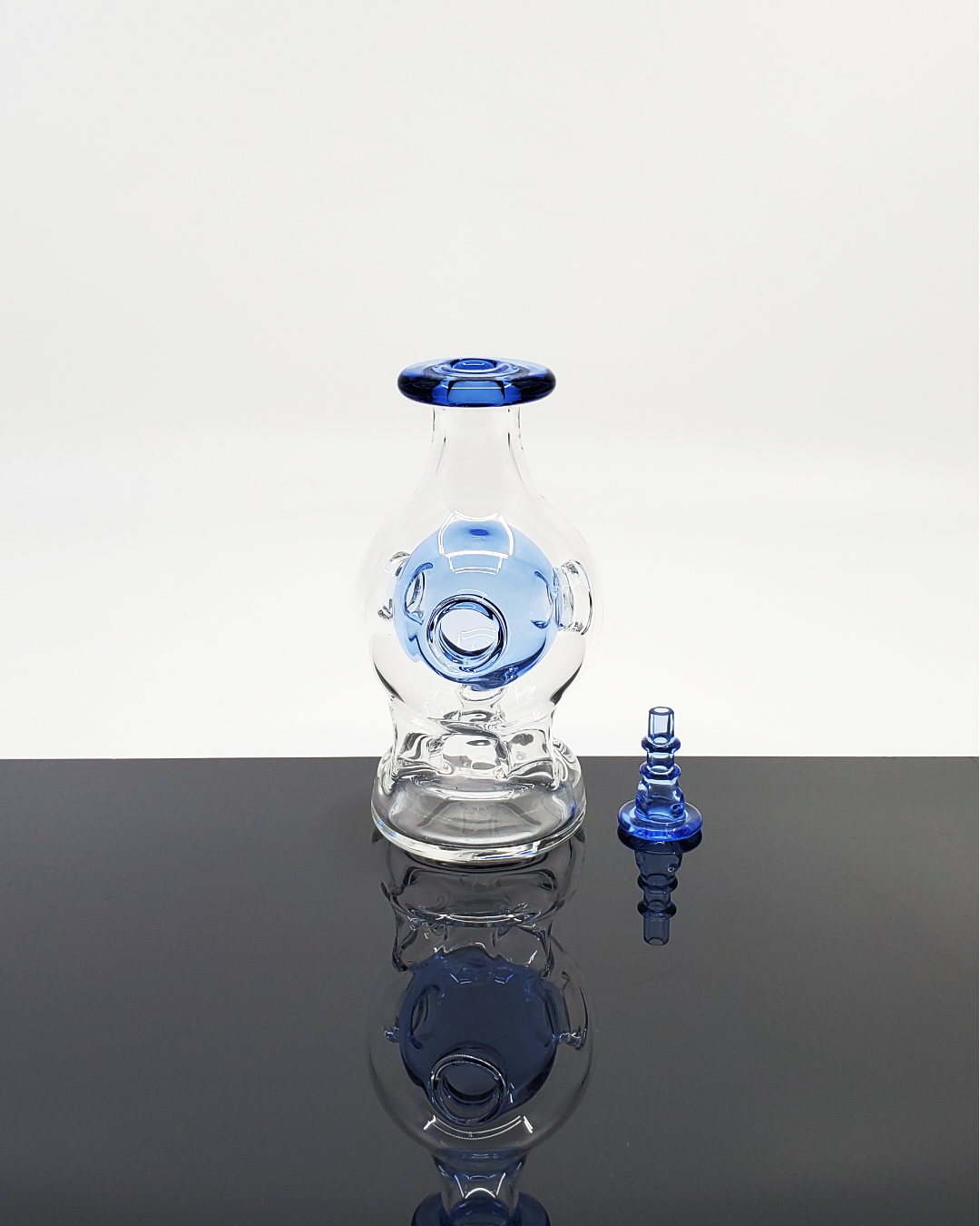 Enhance your Puffco vapor quality with The Glass Mechanic Attachment, a precision-crafted accessory for optimized flavor and performance