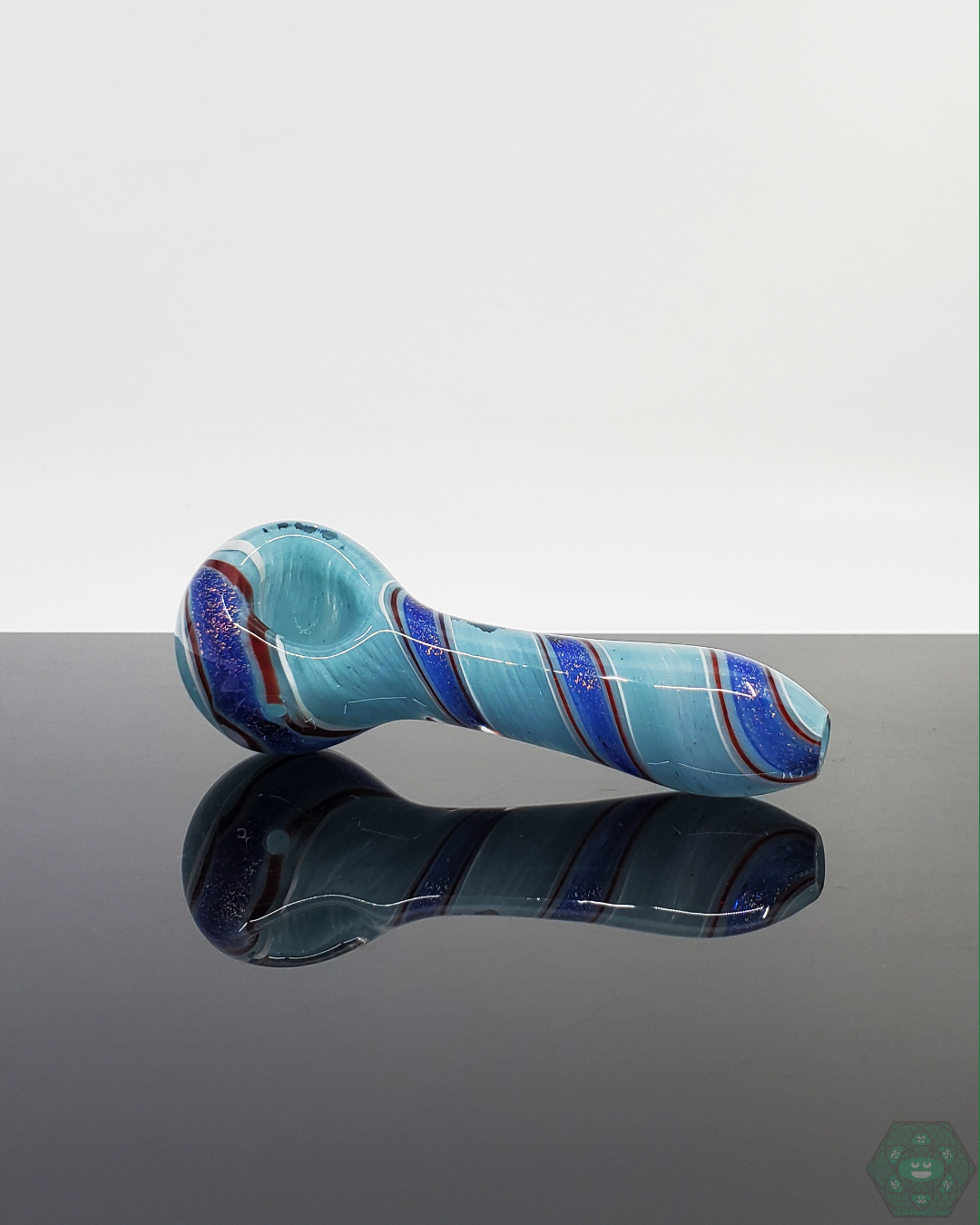 Durable Glass Spoon Pipe with Dichroic Linework by American Spoon. Made for daily use with consistent airflow and a comfortable grip.