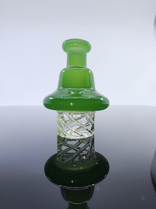 Close-up of the BSG Dot Turbo Spinner Cap, showcasing its intricate dot design and durable construction for better airflow control and more efficient dabbing.