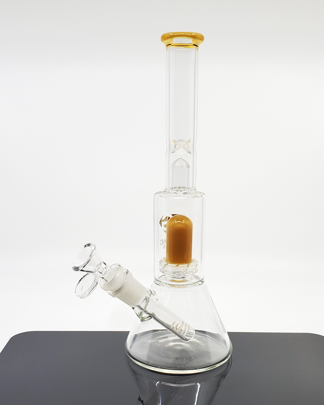 Side view of the Diamond Glass 10.5” Showerhead Beaker showcasing its 7-hole perc and built-in ice catcher for optimal cooling and smooth vapor.