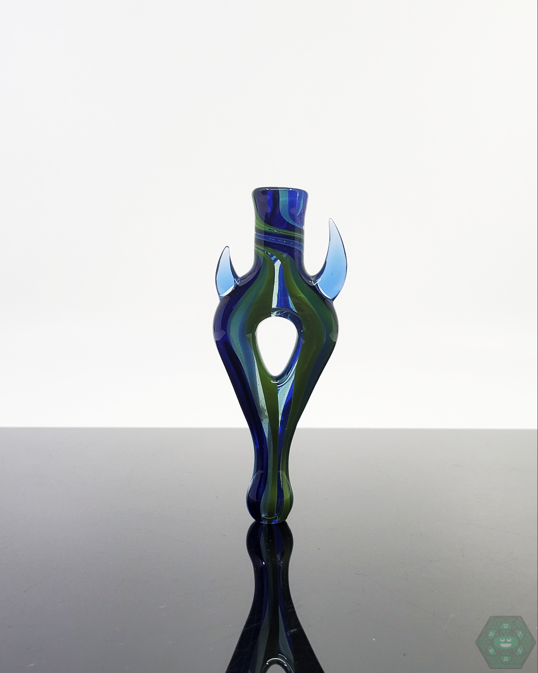 Jon E Walker Donut Chillum, an eye-catching glass piece with a functional design, perfect for enthusiasts and collectors alike