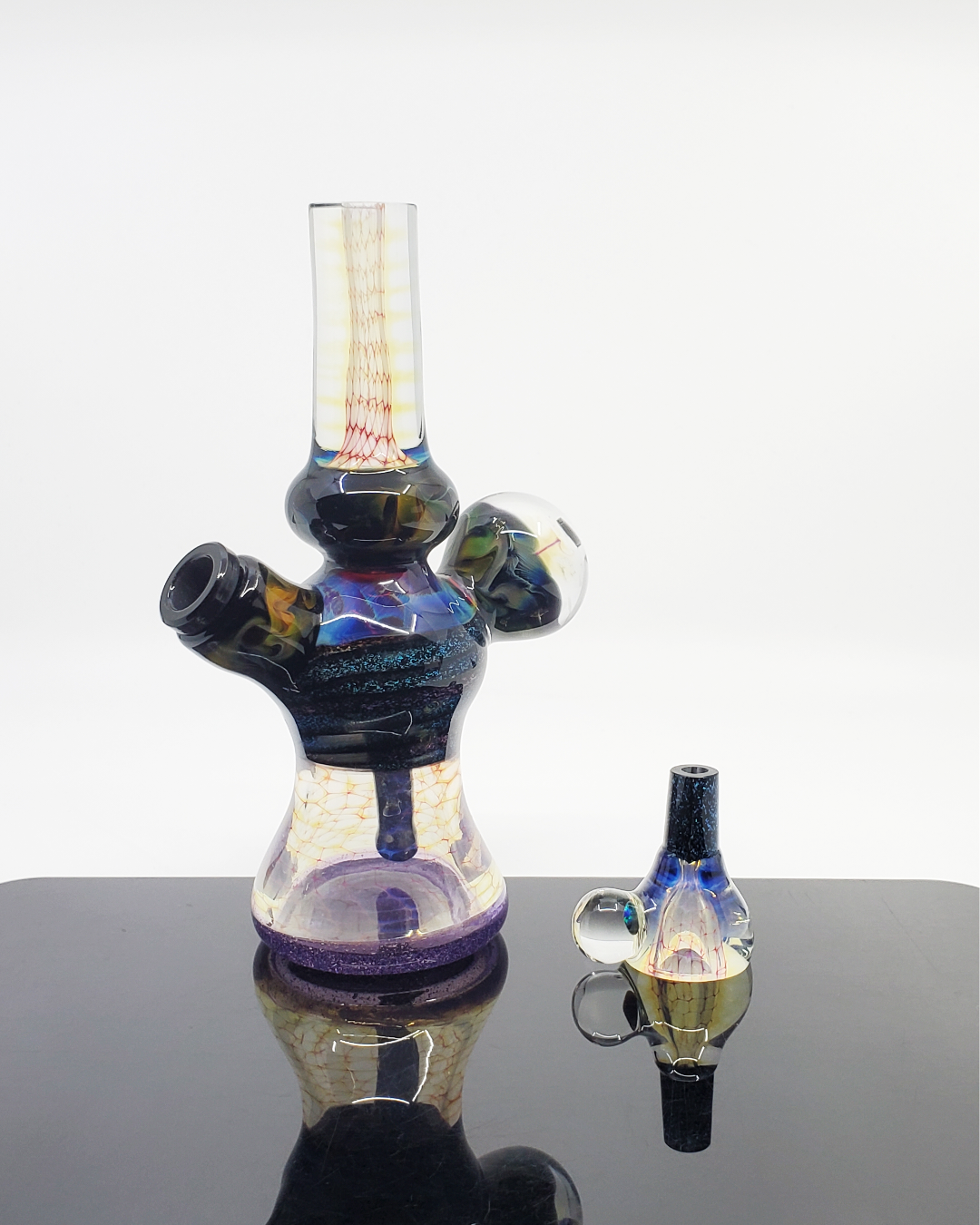 Kenan Tiemeyer Minitube in use, demonstrating its craftsmanship and efficient functionality for smoking enthusiasts.