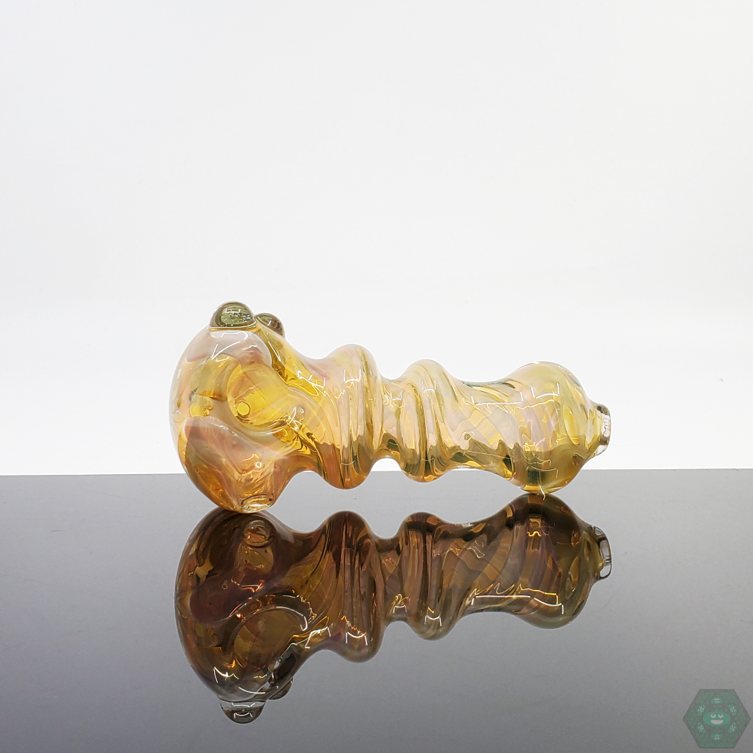 LQL Glass Fumed Spoon in a lifestyle setting, offering a stylish and enjoyable smoking experience.