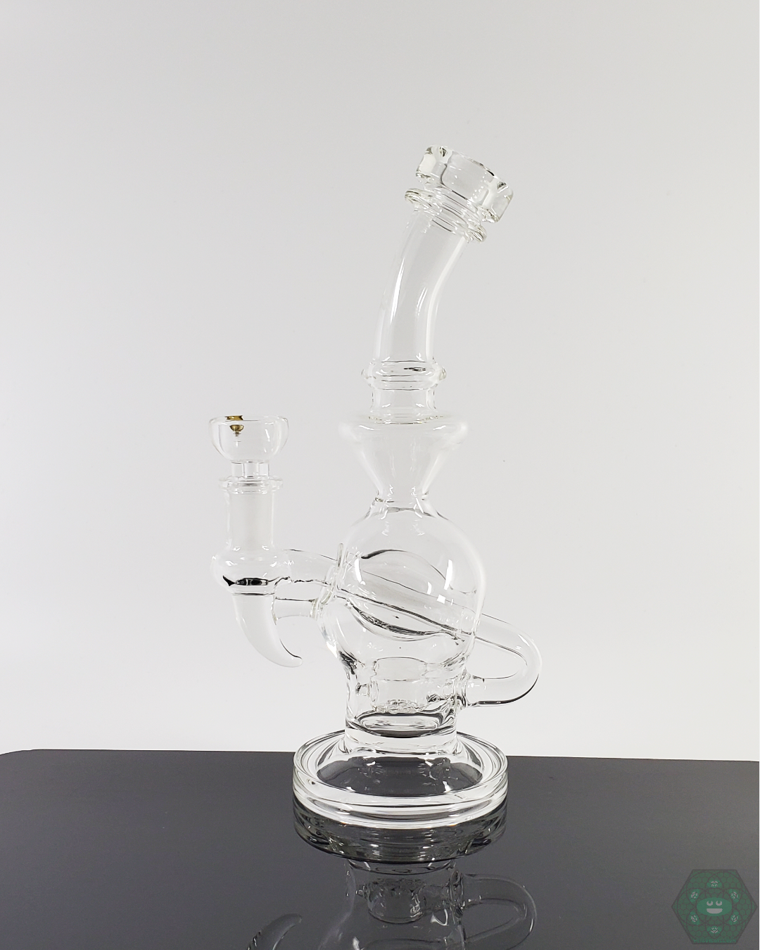 Monark Glass 8-inch Ball Rig featuring a compact size, efficient filtration, and a distinctive ball design for smooth, stylish sessions