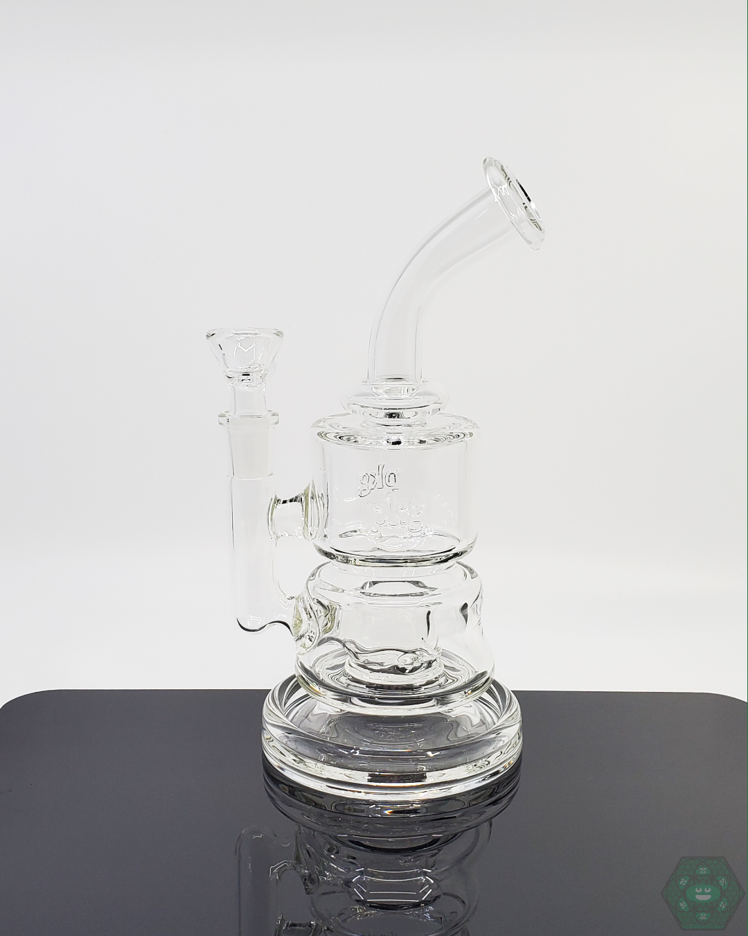 PKG 60mm Puck Rig with 3-hole percolation system, ensuring smooth dabbing sessions with easy maintenance and cleaning