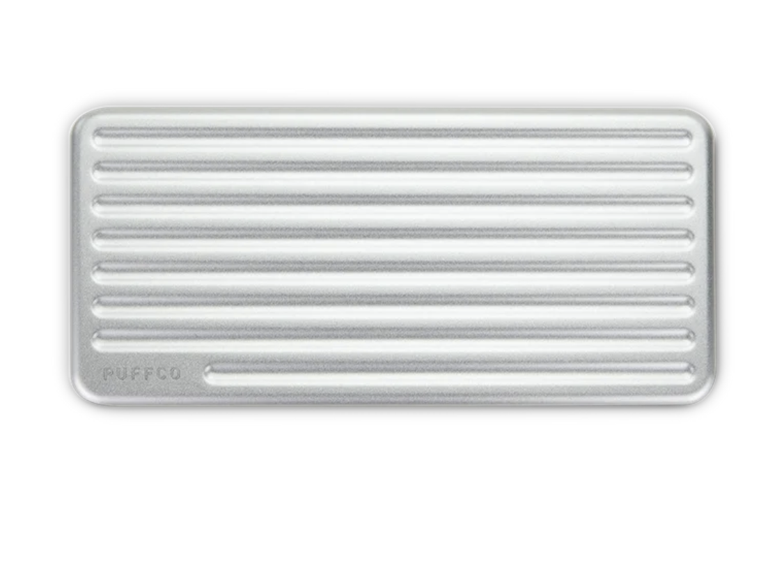 Puffco Pivot Travel Case with hard aluminum exterior and organized compartments to securely store your Pivot, Hot Knife, and accessories.