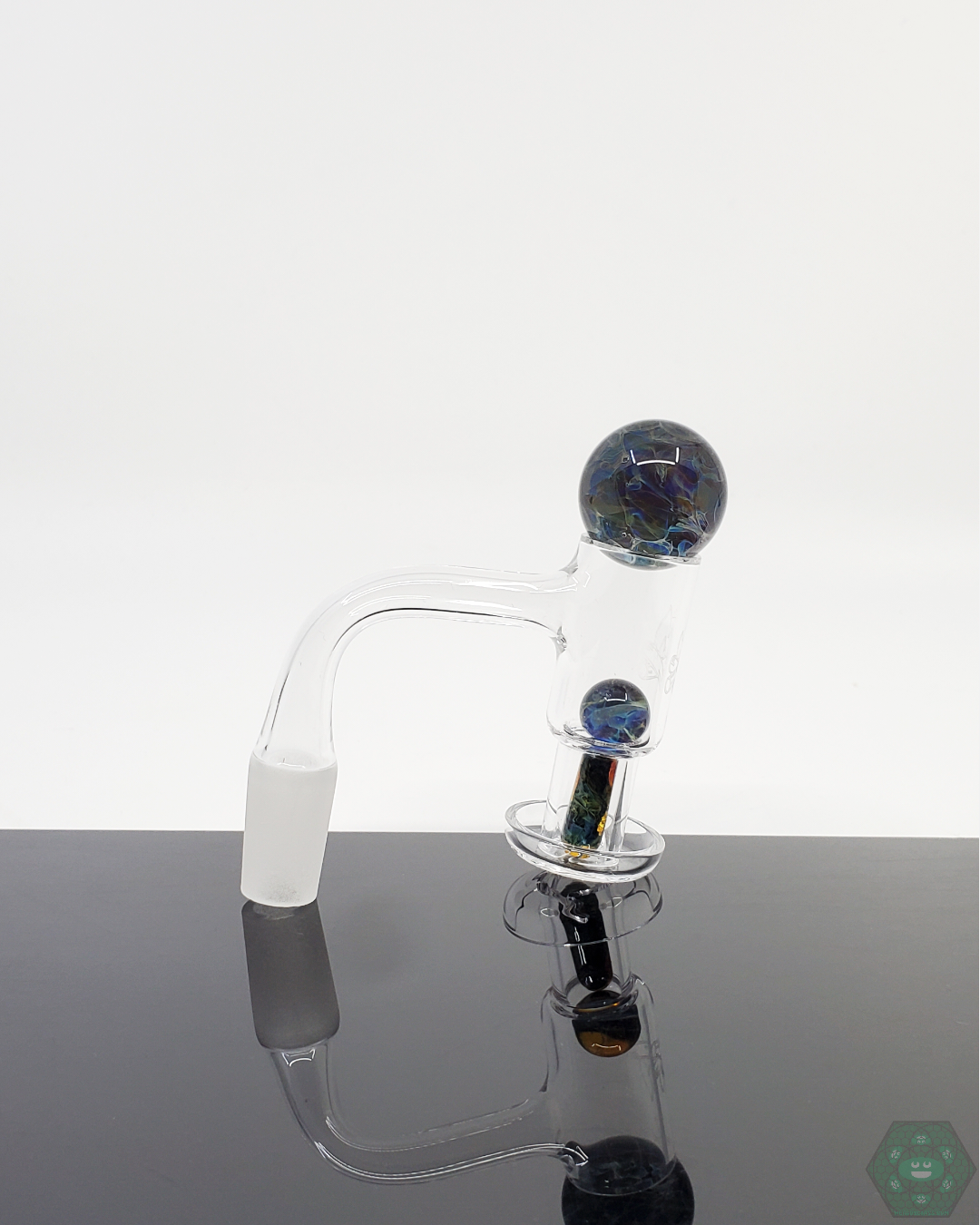 Close-up of the Shredz Glass Slurper Set Bundle, showcasing detailed glasswork and optimal vaporization design.