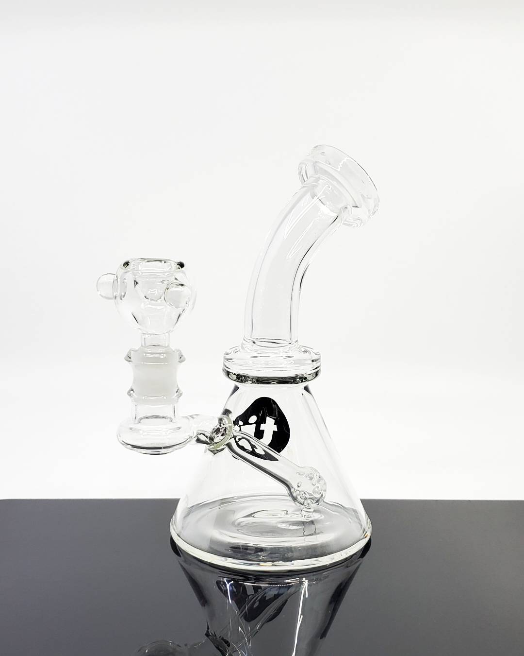Side view of the Ti Ten Glass 7” Banger Hanger showcasing its compact size, 14mm joint, and sturdy construction for efficient use.