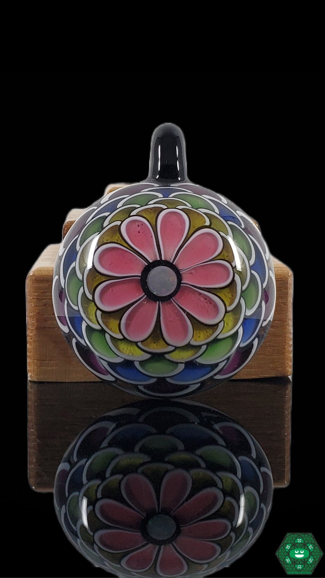 6-Row Rainbow Pendant by RL Dots: This pendant features intricate color work and layering in a radiant display of rainbow hues, making it a perfect accessory for those who appreciate detailed glass artistry and unique layered designs.