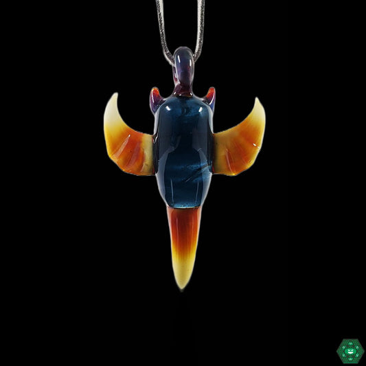 Blue Stardust Owl Pendant - Bearclaw. This handcrafted pendant features an enchanting blue sparkle and is perfect for adding a touch of whimsy and elegance to any outfit.