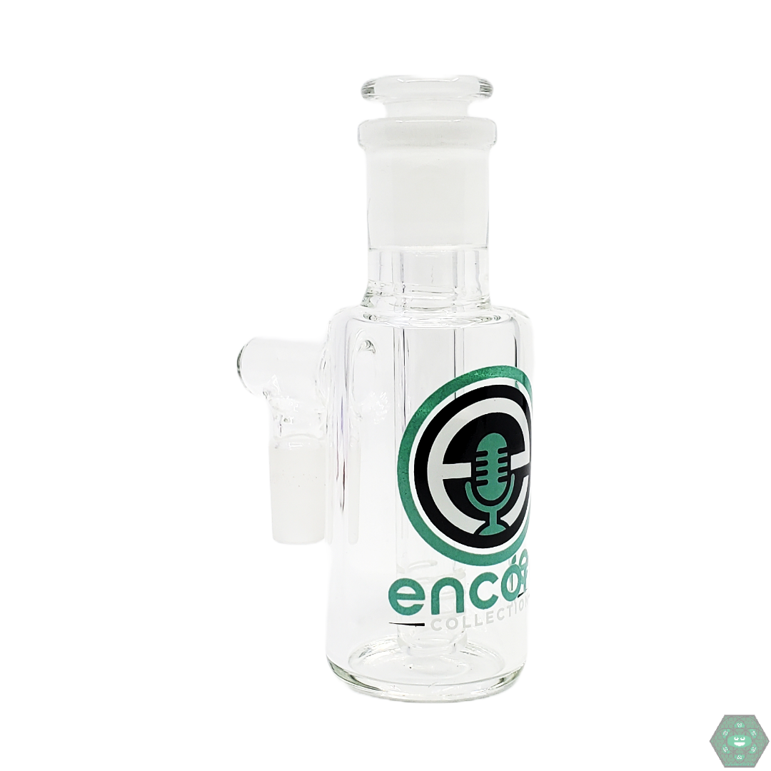 Encore Glass - 14M 90 Drop In Stem Ash Catcher. 14mm Male Joint: Fits standard 14mm female connections. 90° Angle: Ideal for pipes with a 90° joint. 7-Hole Perc: Ensures optimal filtration and smooth airflow. Removable Downstem: Adjustable and easy to clean. Height: 5", Diameter: 1.5", Downstem Length: 4.25".