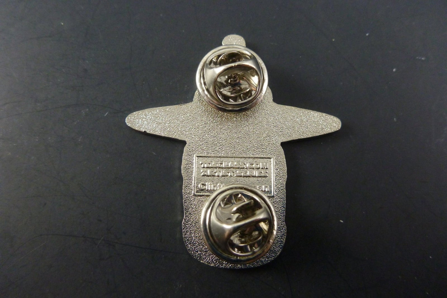 Close-up of Clinton Kachina Pin, showcasing intricate details and craftsmanship, making it a standout piece in any collection of cultural art.