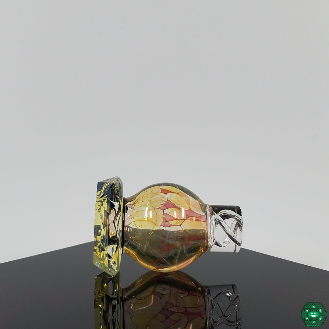 Colorful Brick Glass X Worm Glass Spinner Cap, designed for optimal vapor production and airflow control.