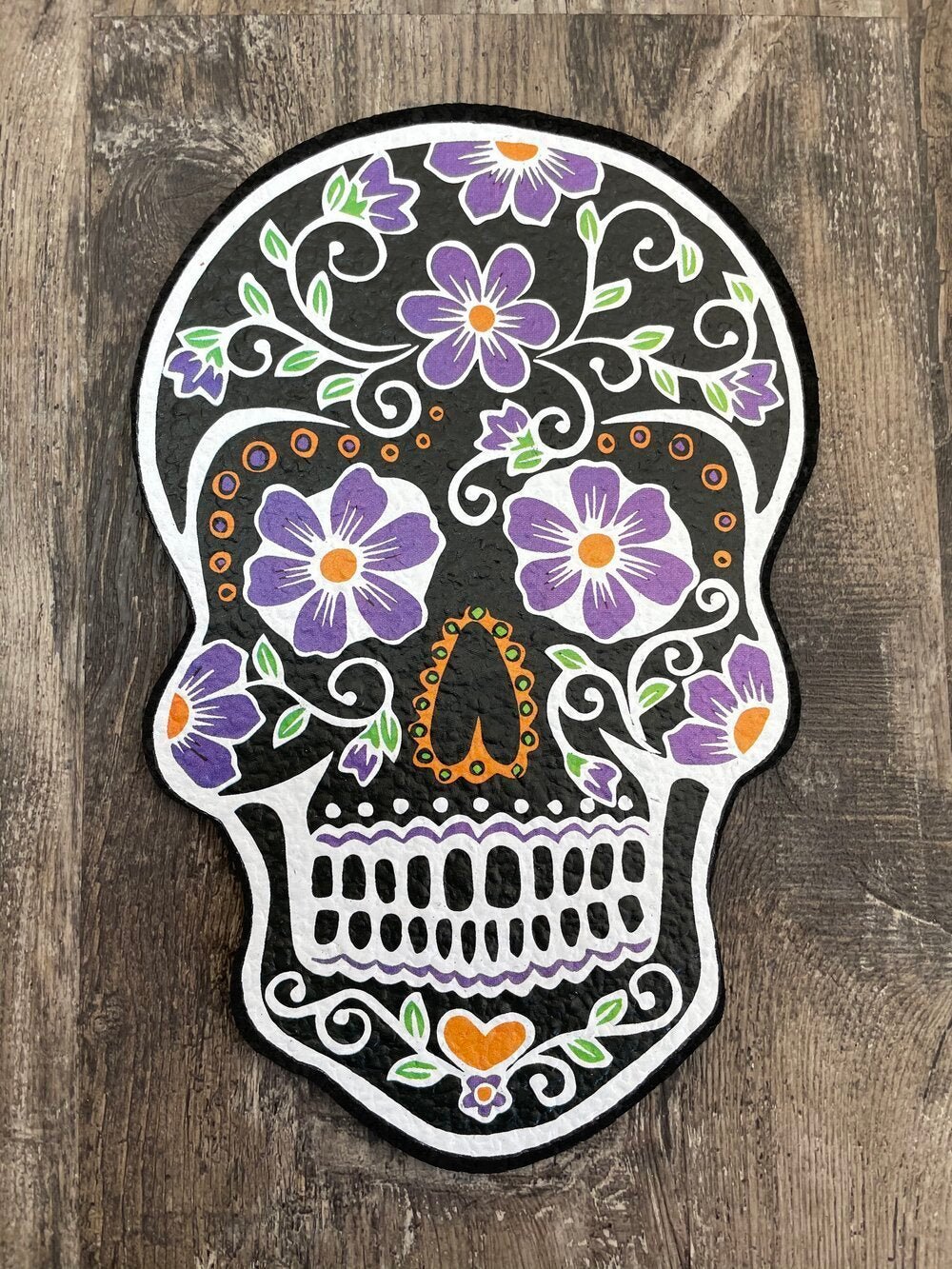 Colorful Dab Mat: The East Coasters Sugar Skull mat adds a vibrant splash of color to your setup, offering a heat-resistant and non-slip surface for your dabbing accessories.
