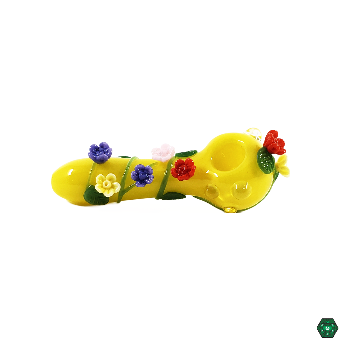 Empire Glassworks Sunshine Garden Spoon in hand, demonstrating its ergonomic 4.75-inch size with a side carb for smooth, controlled pulls during every session.