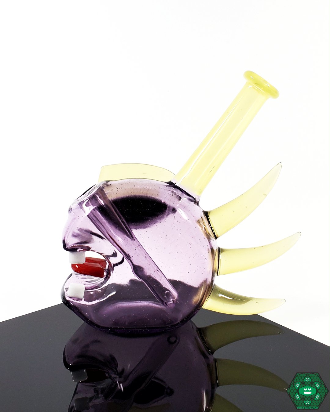 Etai Rahmil Glass Shredder – Compact handcrafted glass art with a 2-hole perc, 10mm female 45° joint, and available in Purple Rain and Pastel Serum colors.