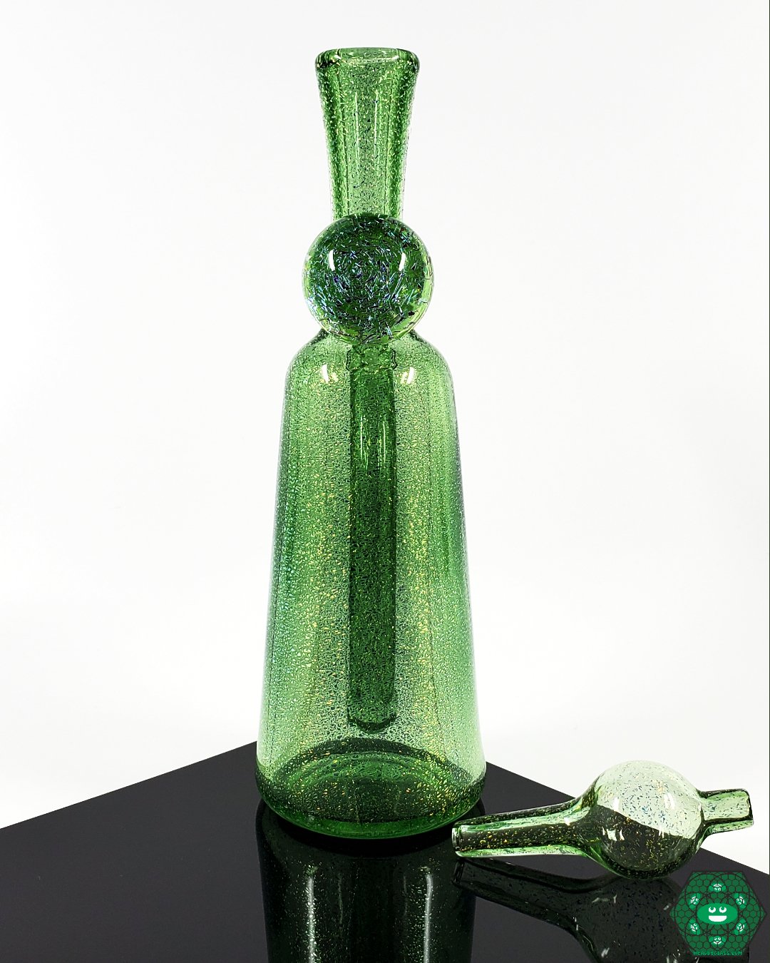 Freeman Mini Tube by Justin Freeman Glass – Custom water pipe with dichroic green finish, 10mm female joint, 2-hole perc, and smooth filtration.