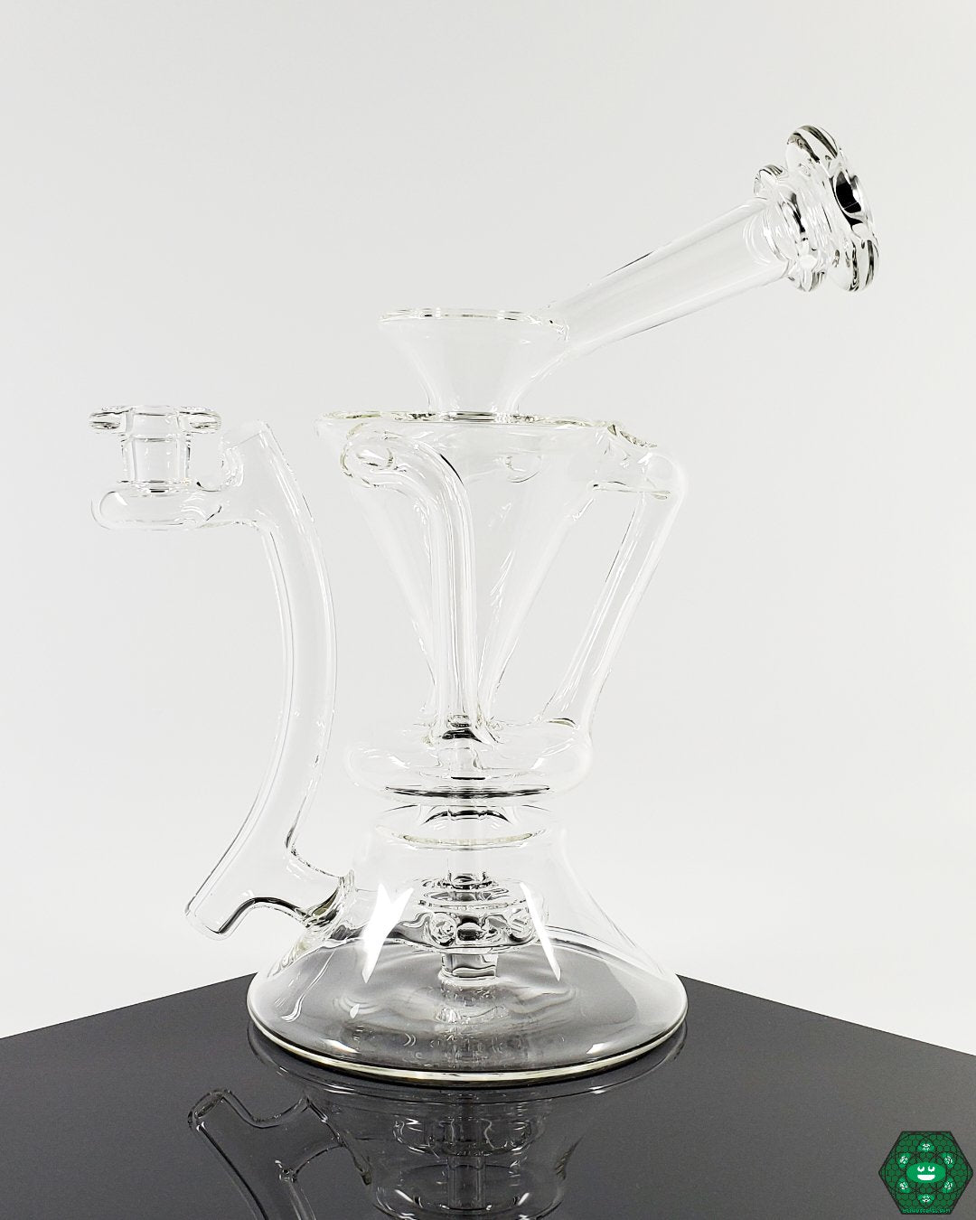 McGrew Glass Clear Internal Recycler #5 Details: Close-up showcasing the clear glass construction and internal recycling system designed for superior filtration and smooth hits.