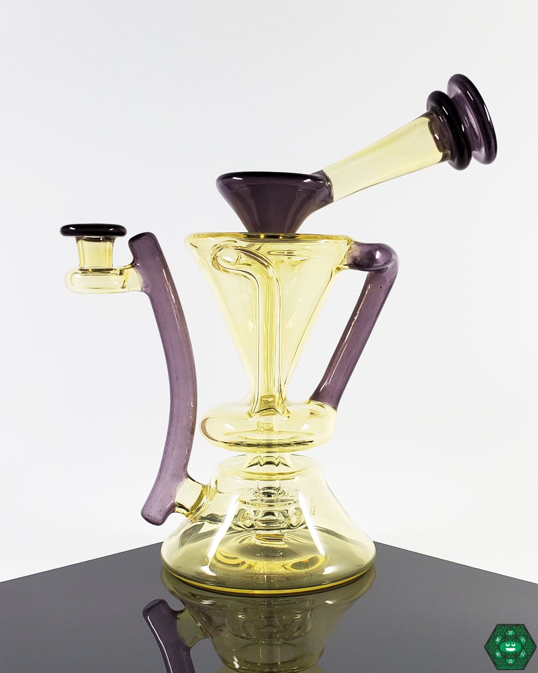 McGrew Glass Silver Serum Recycler Details: Close-up showcasing the innovative silver serum feature and high-grade borosilicate glass construction of this unique rig.
