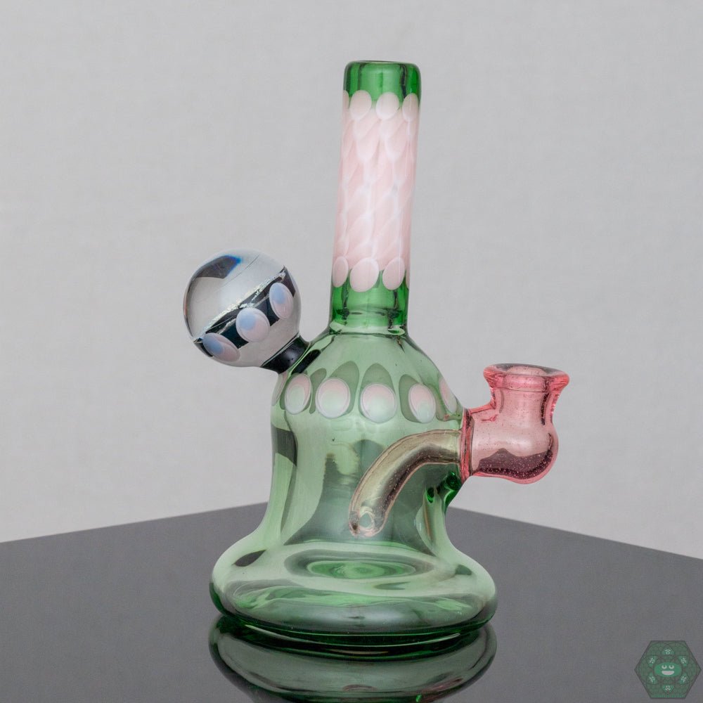 Natrix Glass Mini Tube #7 – Vibrant, compact glass rig with intricate dichroic detail and smooth airflow.