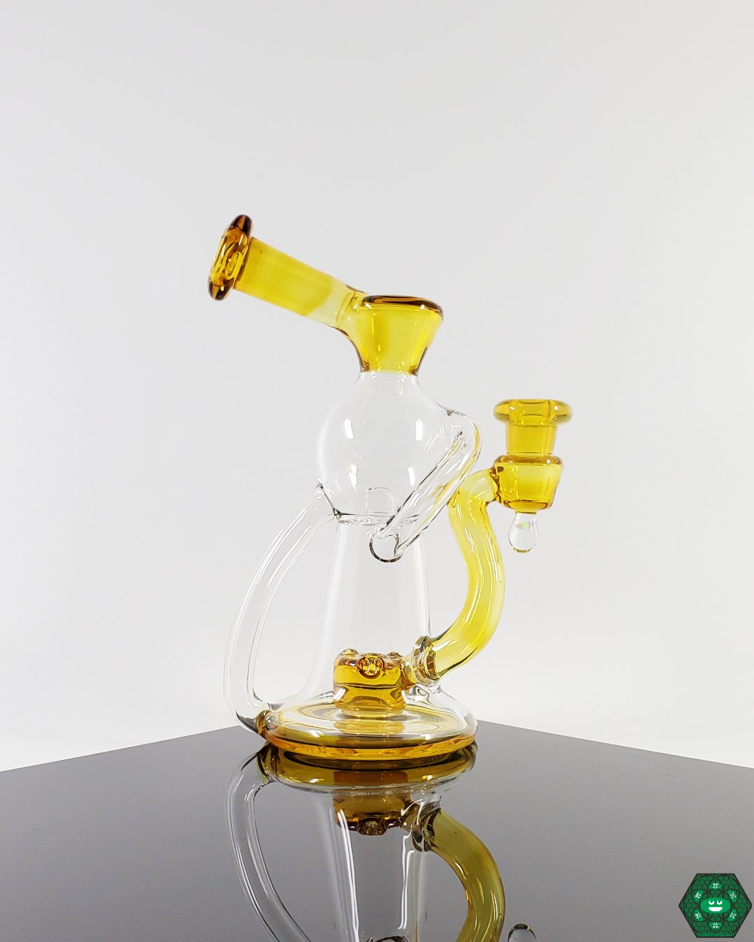 OM Glass Co Water Slide Details: Close-up showcasing the unique flow system and sleek design of this precision recycler, highlighting its functionality for smooth and enjoyable dabbing.