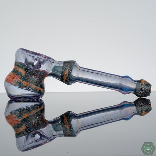 Stacked Glass Hammer Pipe: The Middleton Glassworks Chip Stacked Hammer features a unique layered glass design, creating a visually appealing and distinct aesthetic.