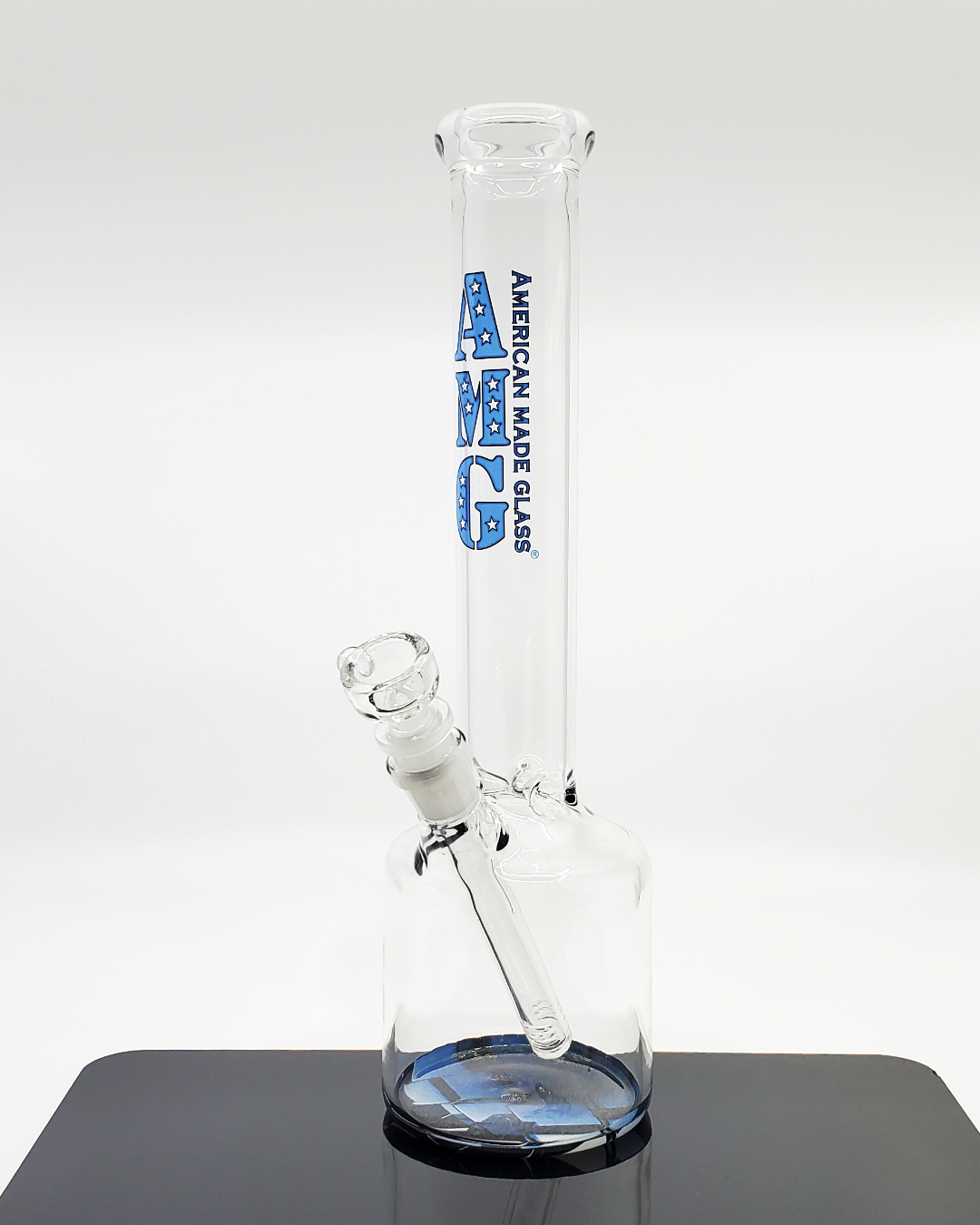 12 Inch Beaker Bong by AMG Glass. This sturdy beaker bong features classic filtration for a smooth smoking experience.