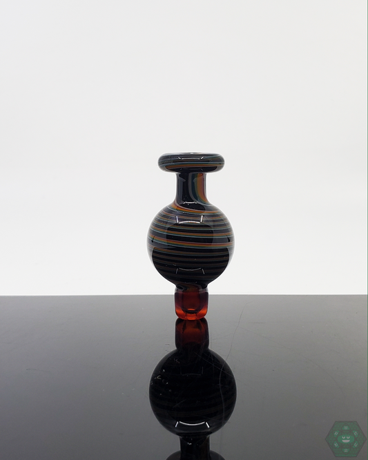  217 Glass WigWag Bubble Cap for Quartz Bangers. Enhance your dabbing experience with this visually appealing, high-quality glass bubble cap. Helps control airflow for even vapor and enhanced flavor. Durable and easy to handle.