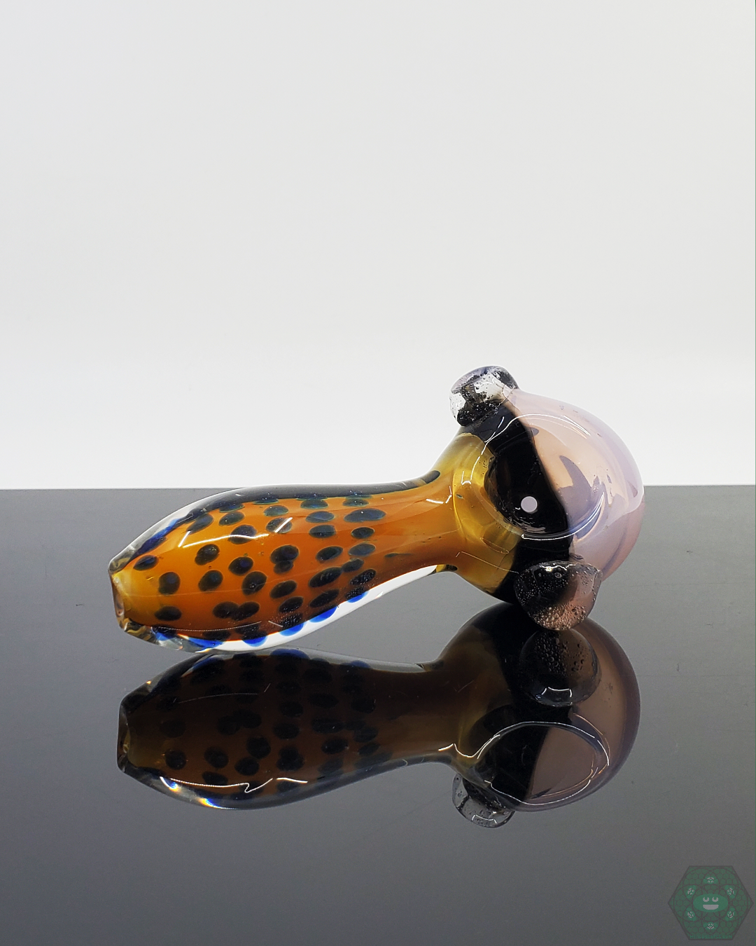 Artistic Dot Work Glass Spoon Pipe from American Spoon. Add a touch of style to your smoking collection with this unique and eye-catching spoon pipe.