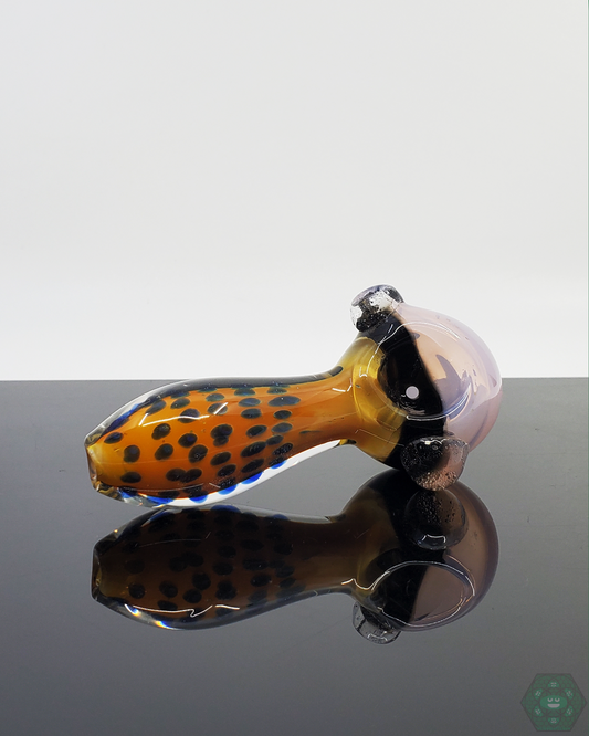 Artistic Dot Work Glass Spoon Pipe from American Spoon. Add a touch of style to your smoking collection with this unique and eye-catching spoon pipe.