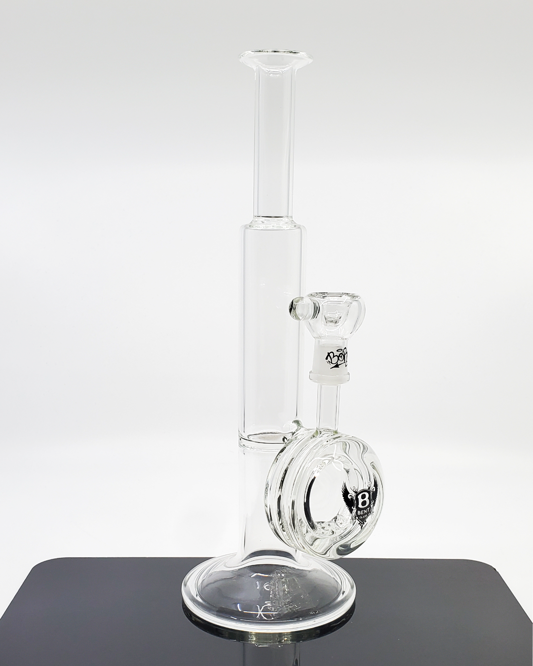 Bent Glass 12" Straight Tube Bong | Durable Glass Water Pipe. Featuring a 14MM male joint and 14MM female slide, this piece is designed for easy use. 2-hole bubble perc for improved filtration.
