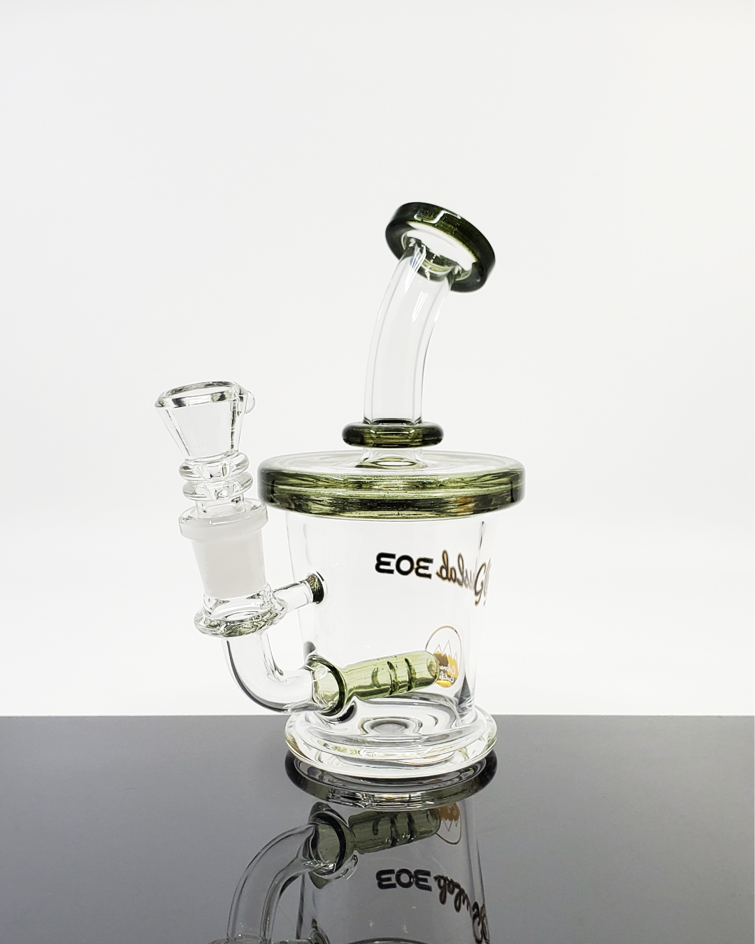 Glass Lab 303 5.5” Mini Inline Banger Hanger | Compact with Inline Perc | 14mm Joint. This 5.5” mini inline banger hanger by Glass Lab 303 features a 4-hole inline perc and a 14mm female joint for efficient filtration. Compact and perfect for smooth hits.