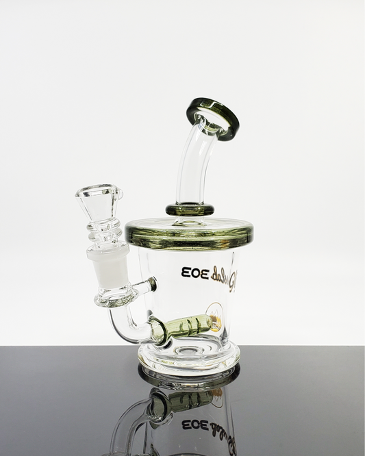 Glass Lab 303 5.5” Mini Inline Banger Hanger | Compact with Inline Perc | 14mm Joint. This 5.5” mini inline banger hanger by Glass Lab 303 features a 4-hole inline perc and a 14mm female joint for efficient filtration. Compact and perfect for smooth hits.