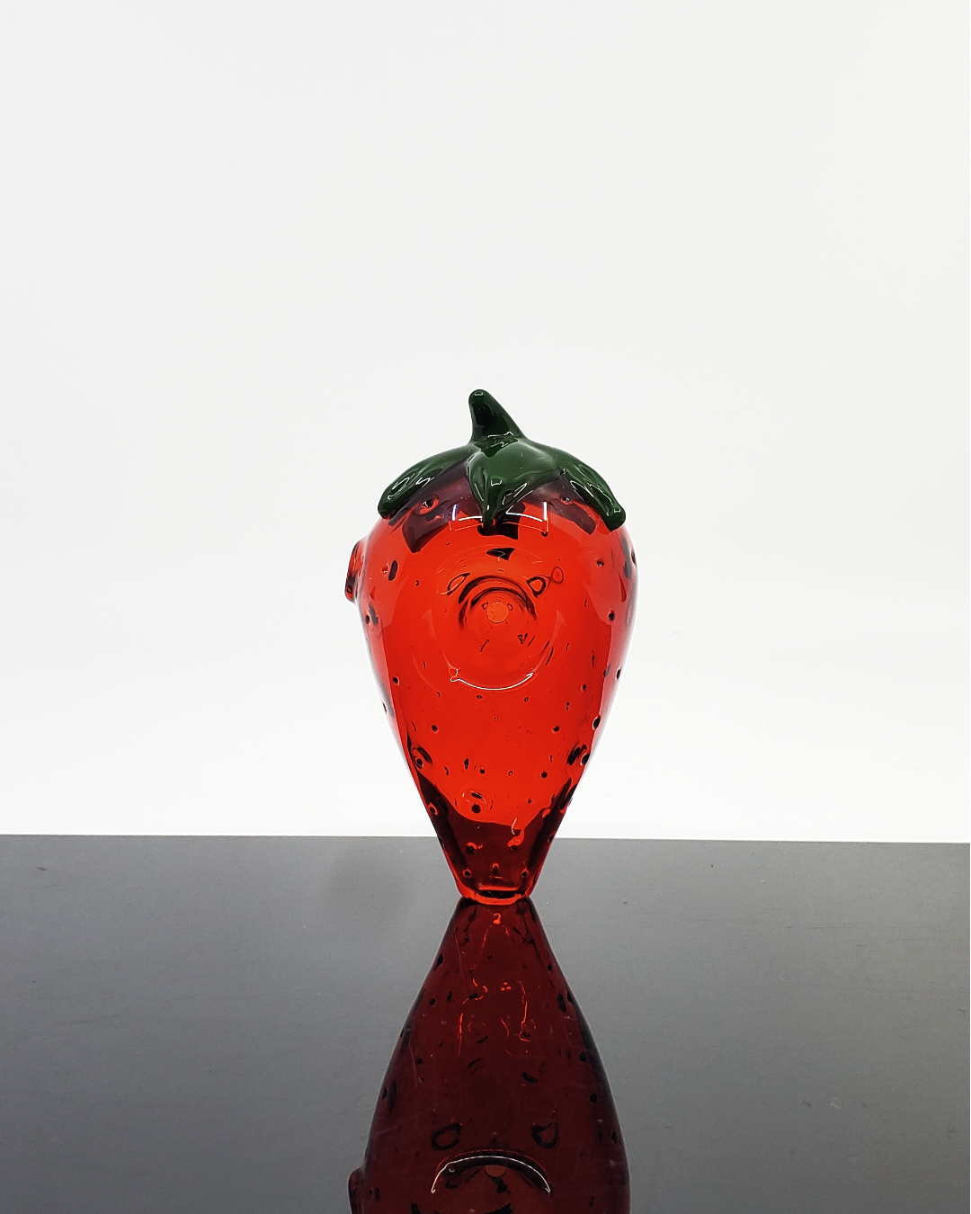 Glass by Boots - Strawberry Spoon – Unique Strawberry-Shaped Spoon Pipe. Creative Strawberry Design: Adds a unique, playful look. Quality Glass Construction: Durable and ideal for frequent use. Smooth Airflow: Designed for balanced hits with a comfortable grip.