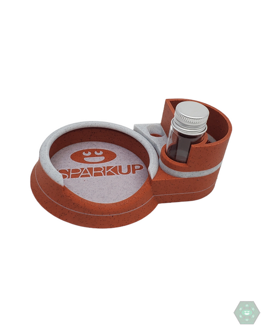 Spark Up Designs Puffco Stabilizer Multicolor Station | Secure Puffco Stand | Stylish Design. Keep your Puffco safe with the Spark Up Designs Stabilizer Station. Featuring a sturdy, multicolor design, it ensures stability for your device and adds a unique aesthetic to your setup.