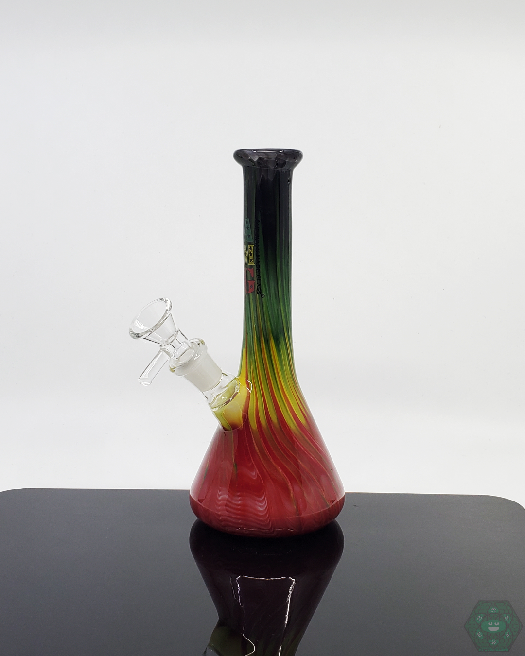 Rasta Beaker Bong - 7.75 Inch - AMG Glass. This vibrant Rasta Beaker features a sturdy build and smooth filtration. Perfect for any smoking enthusiast.
