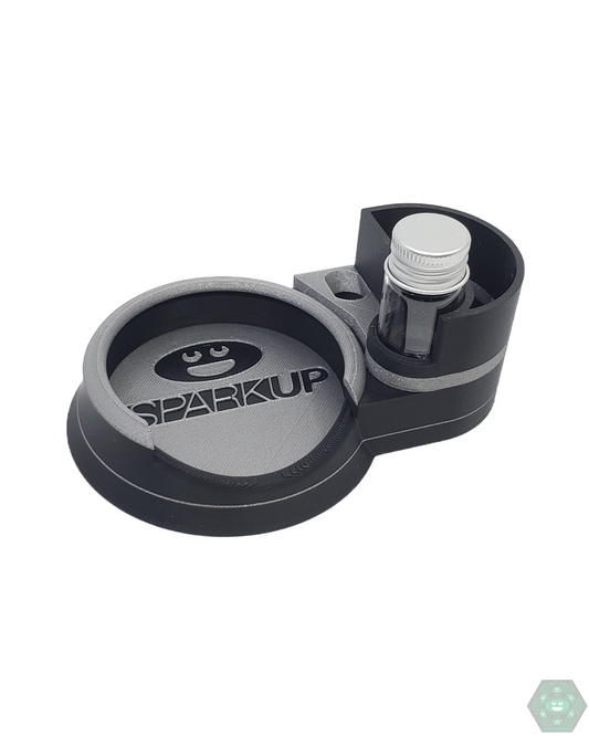 Spark Up Designs Puffco Stabilizer Multicolor Station | Secure Puffco Stand | Stylish Design. Keep your Puffco safe with the Spark Up Designs Stabilizer Station. Featuring a sturdy, multicolor design, it ensures stability for your device and adds a unique aesthetic to your setup.