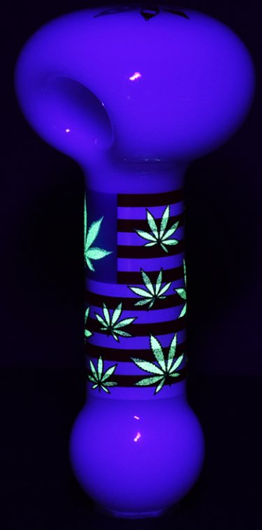 American Hemp Leaf Flag Glow Glass Spoon Pipe – 4-inch spoon-style pipe with red, white, blue flag design and hemp leaves, made of durable borosilicate glass, glow in the dark feature.