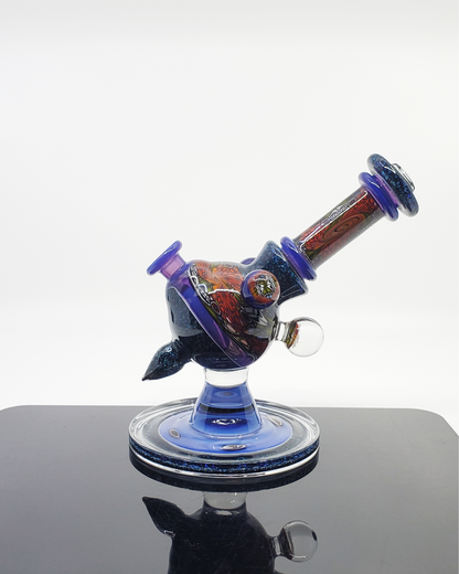 Artisanal Heady Glass Rig: The Cajun Glass Chip Stack Heliosphere combines artistic layered glass detail with smooth performance in a unique 14mm dab rig designed for connoisseurs.