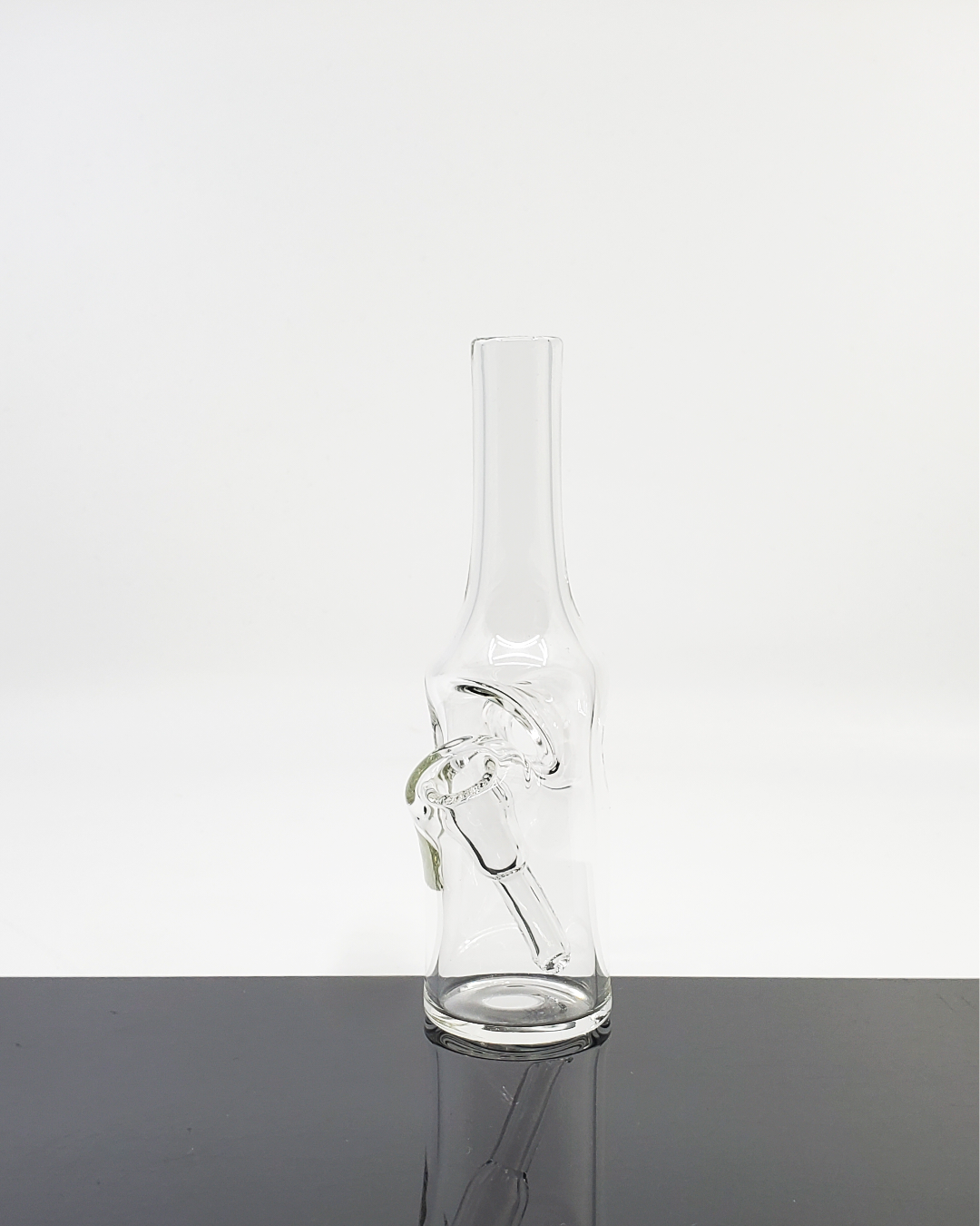 Bro D Glass Clear Mini Bottle, a portable glass water rig designed for smooth, flavorful dabbing sessions.
