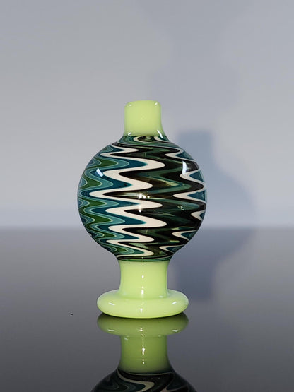  BSG Color Wig-Wag Reversal Bubble Cap placed on a 25mm quartz banger, optimizing vapor flow and ensuring a smoother, more flavorful dabbing experience.