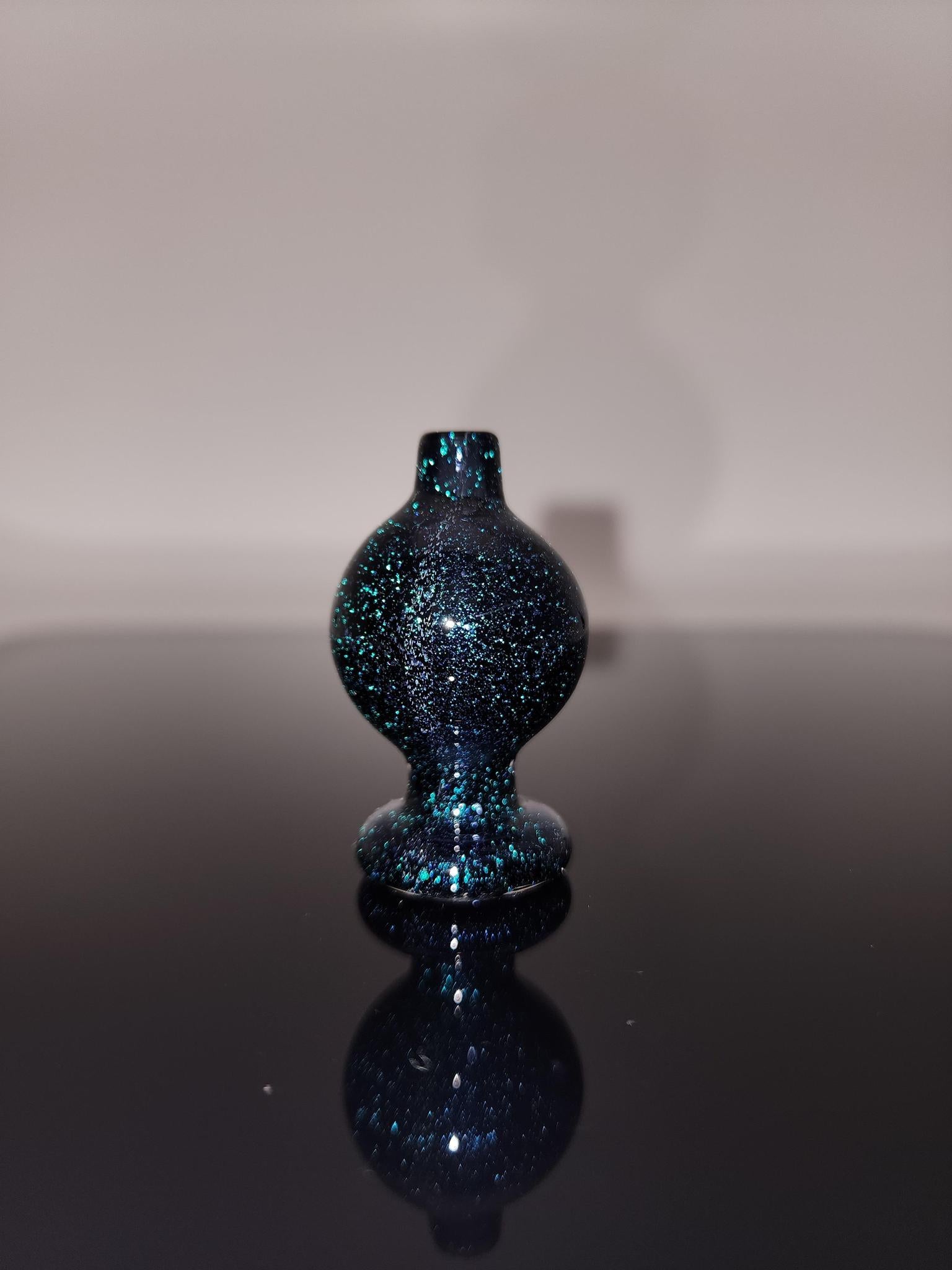 Close-up of the BSG Dichro Bubble Cap, showcasing its stunning dichroic finish and durable construction, perfect for optimizing dabbing performance.
