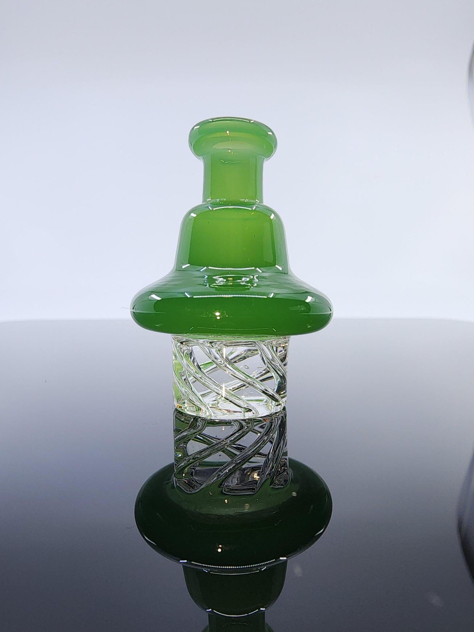 Close-up of the BSG Dot Turbo Spinner Cap, showcasing its intricate dot design and durable construction for better airflow control and more efficient dabbing.