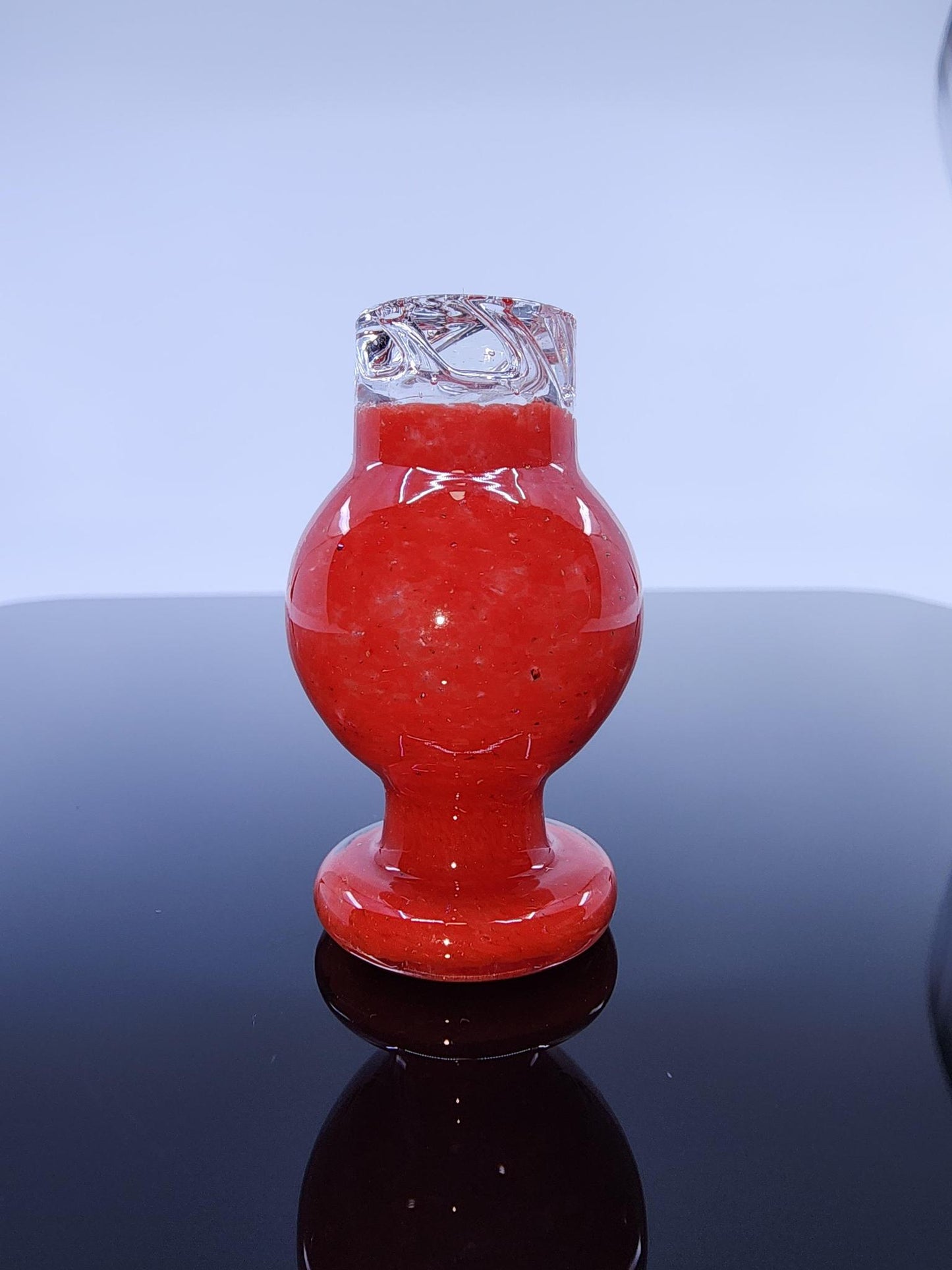 BSG Dot Turbo Spinner Cap in hand, demonstrating its ergonomic design and comfortable grip for easy and efficient use.