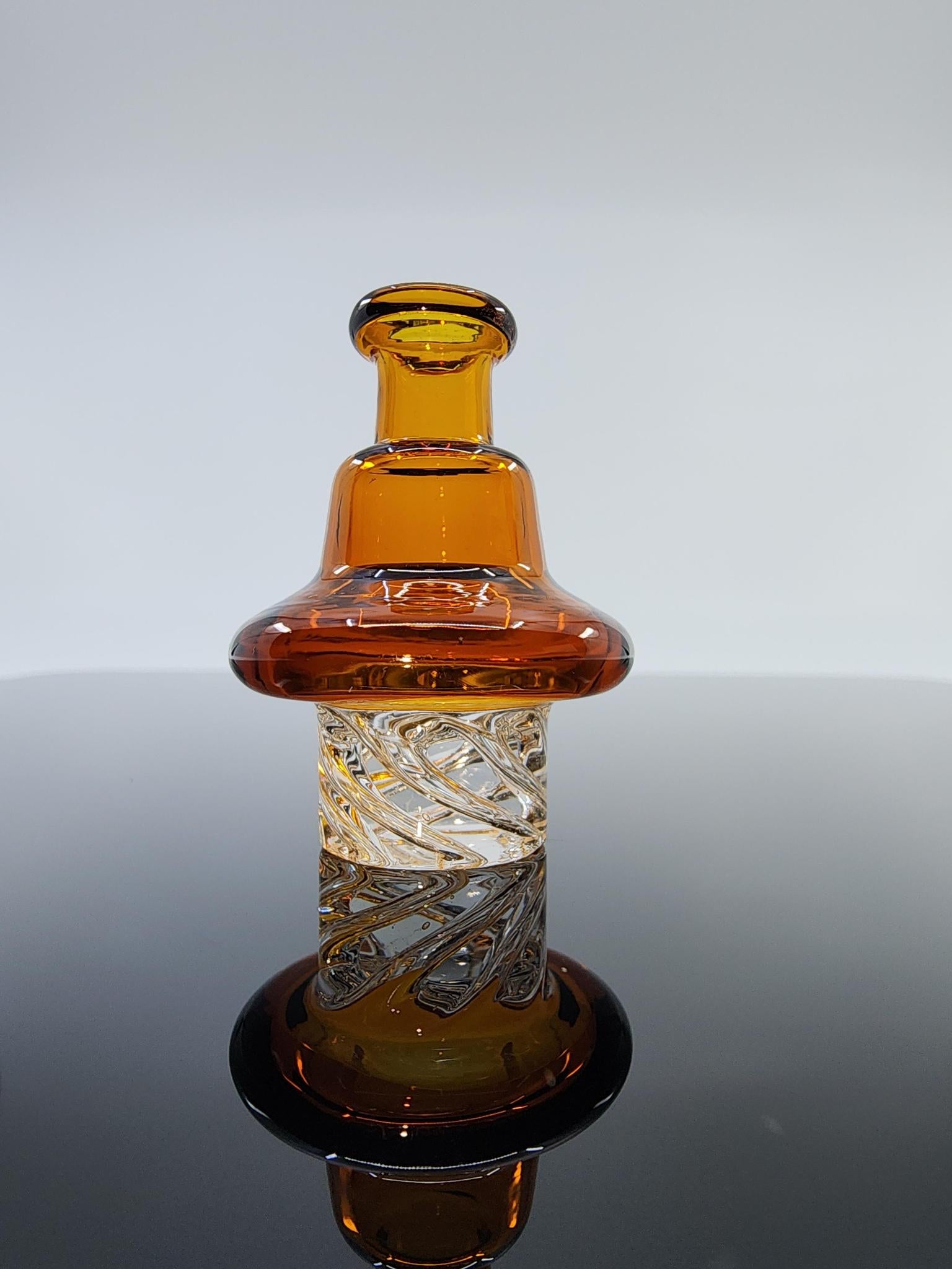 Side view of the BSG Dot Turbo Spinner Cap, highlighting its functional and stylish design for optimal airflow and vapor control during dabbing sessions.