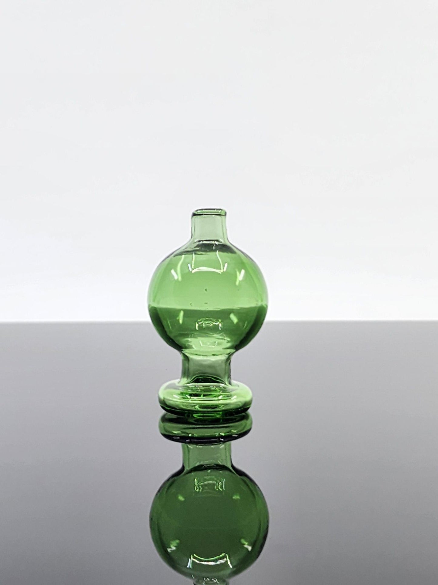  Close-up of the BSG Full Color Bubble Cap, showcasing the detailed, colorful design and durable construction for efficient airflow and improved vapor control.