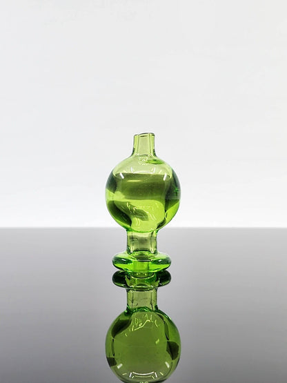 BSG Full Color Bubble Cap in hand, demonstrating its ergonomic design and comfortable grip for easy handling during dabbing sessions.