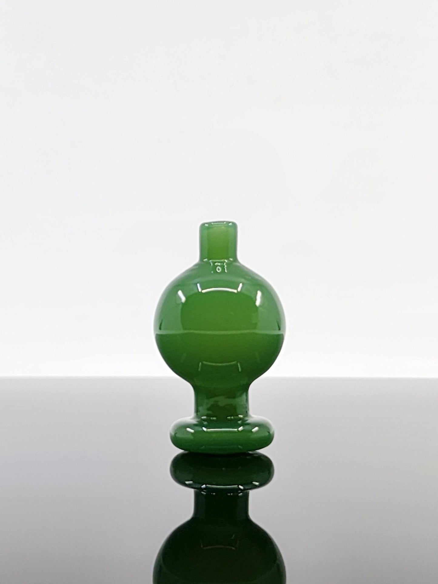 BSG Full Color Bubble Cap in use on a dab rig, ensuring optimal airflow and vapor production for a high-quality dabbing experience.