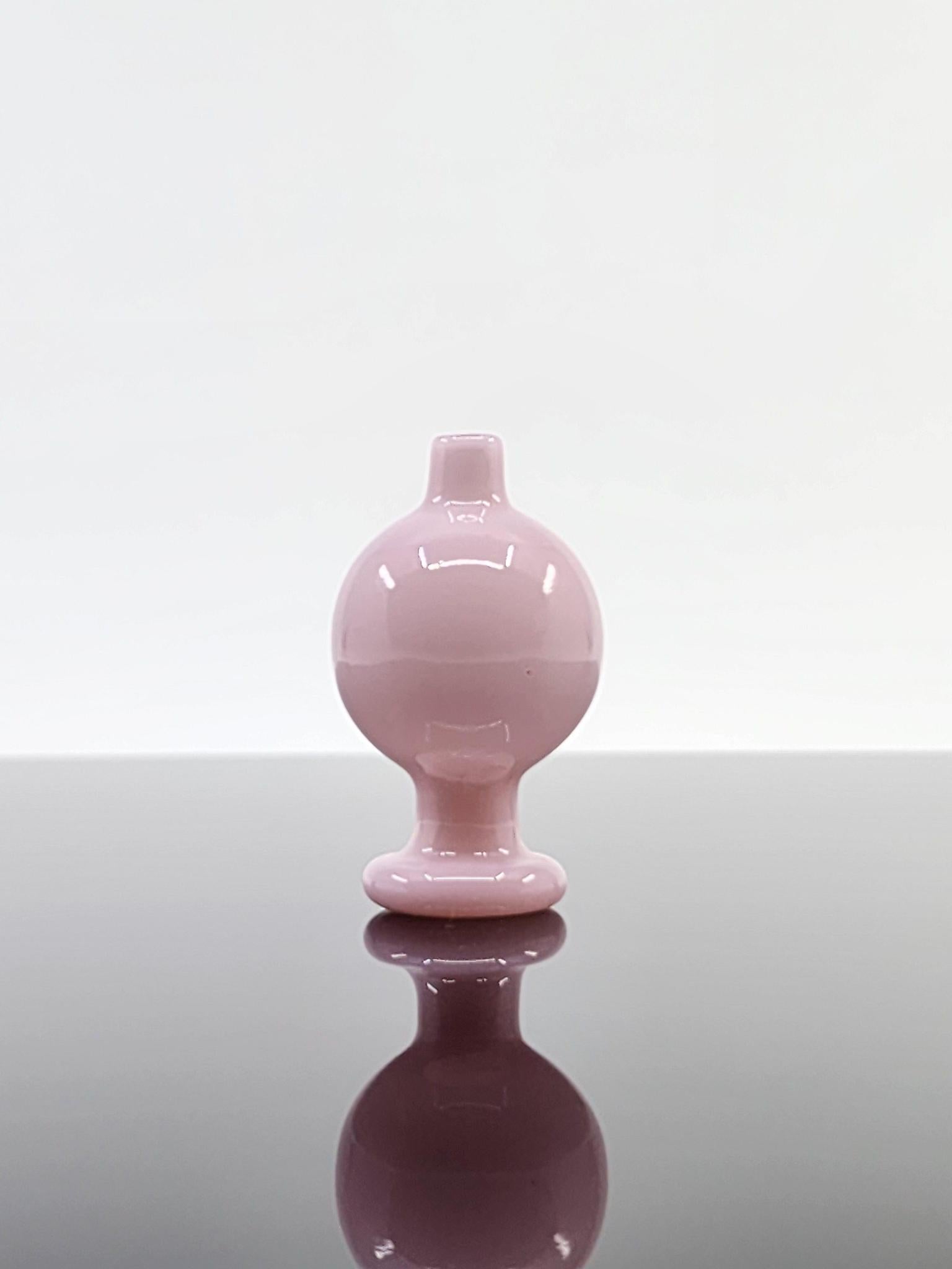  Side view of the BSG Full Color Bubble Cap, highlighting its vibrant color and smooth design for optimal airflow during dabbing.