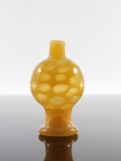 BSG Full Color Honeycomb Bubble Cap attached to a 25mm quartz banger, enhancing vapor flow and ensuring smooth, flavorful dabs.